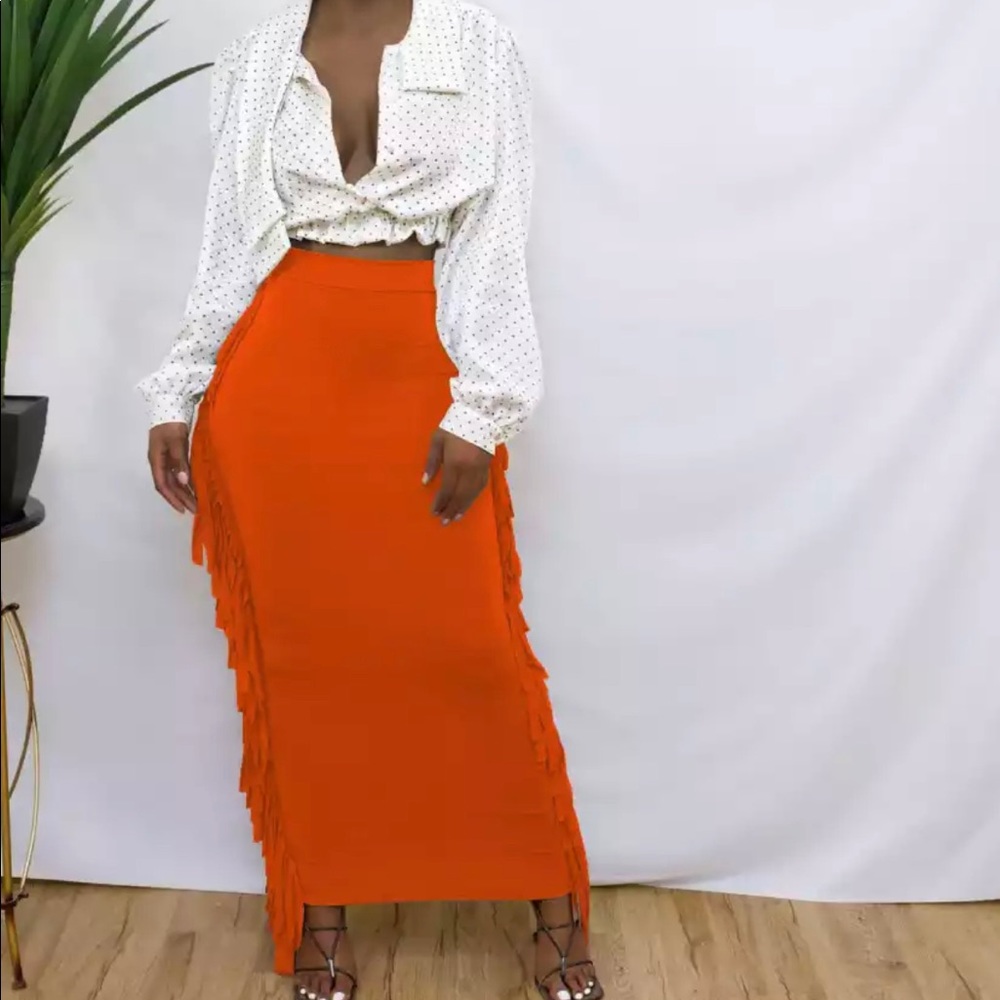 Beautiful tassel orange skirt.